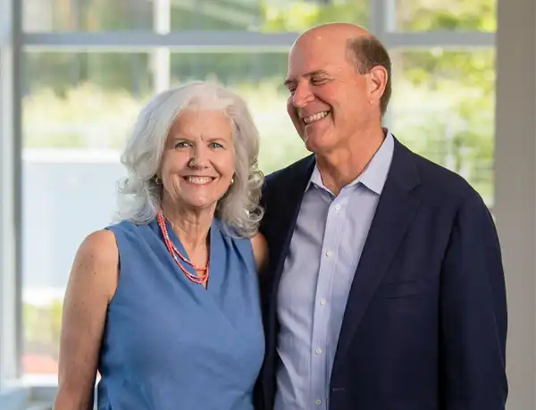 Barbara and Peter Pruitt standing and smiling