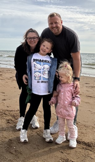 Daisy with her family