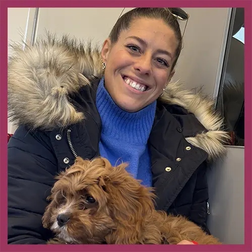 Michelle holding her dog