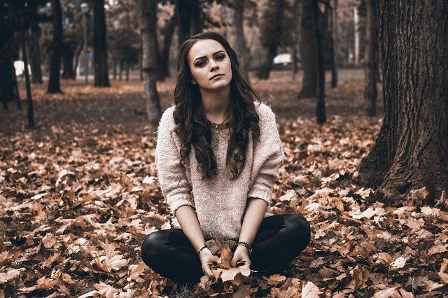 Woman sitting in a park