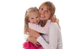 Mom hugging child